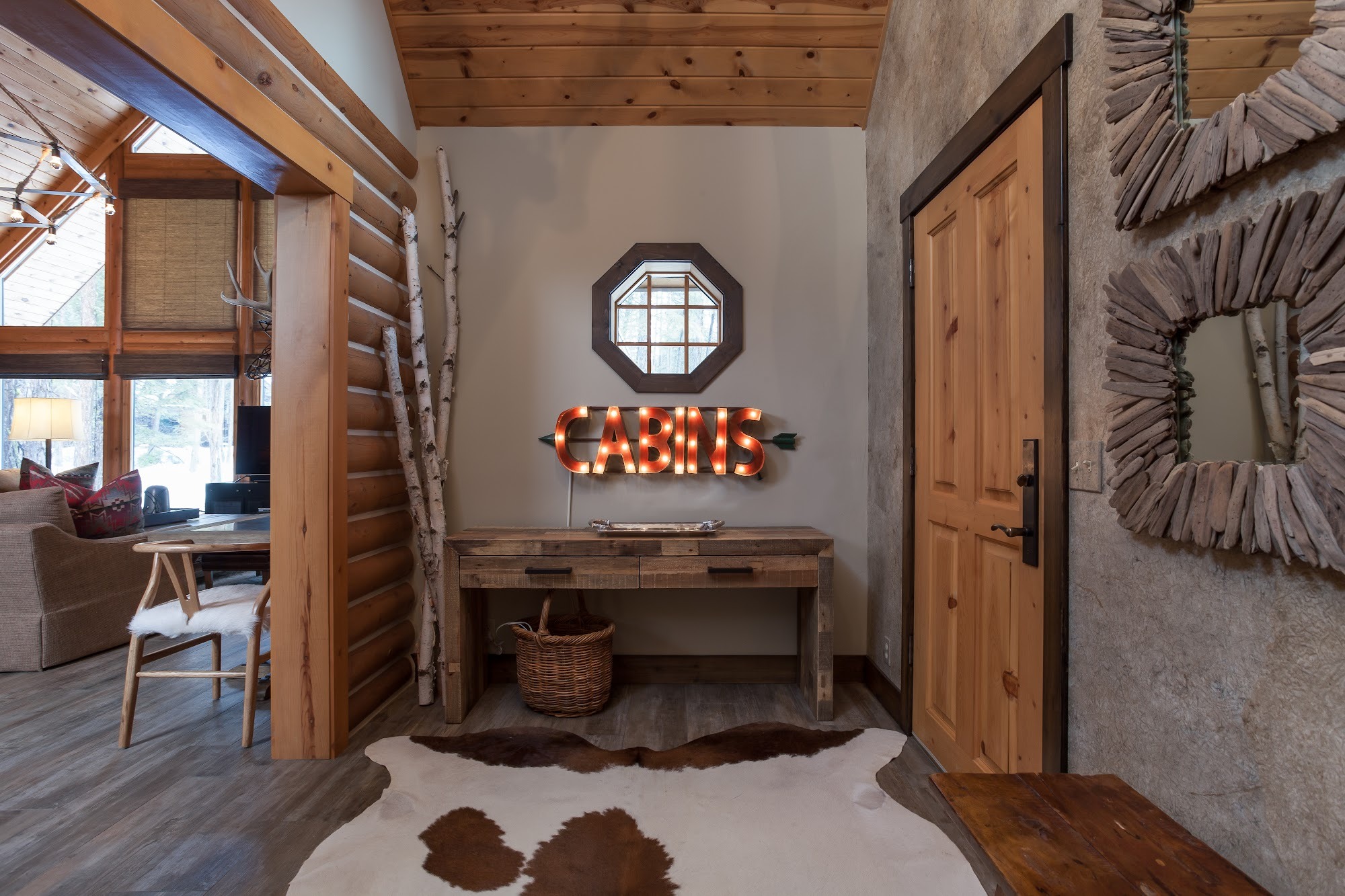 Rustic log-cabin entryway styled by J Rowland Home