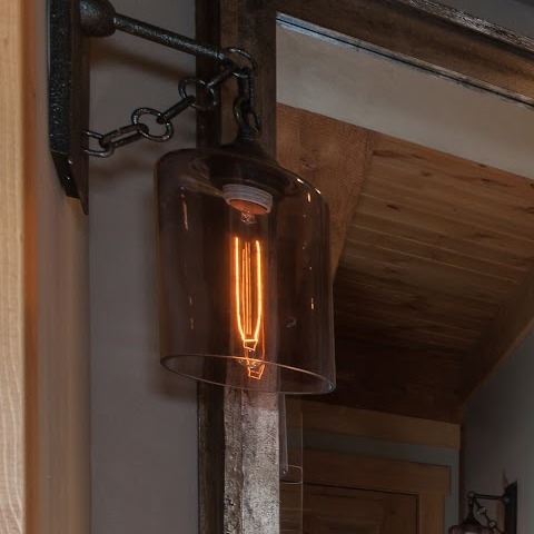 Detail of a hanging Edison-bulb pendant sconce